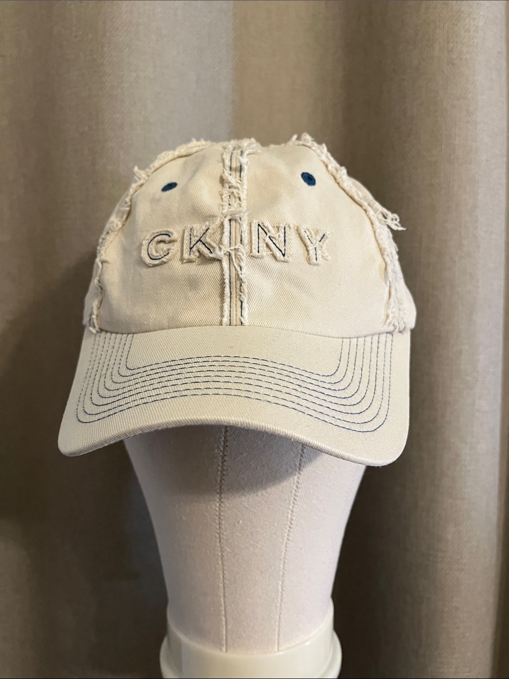 Calvin Klein Frayed Edge Baseball Cap in Beige with Blue stitching